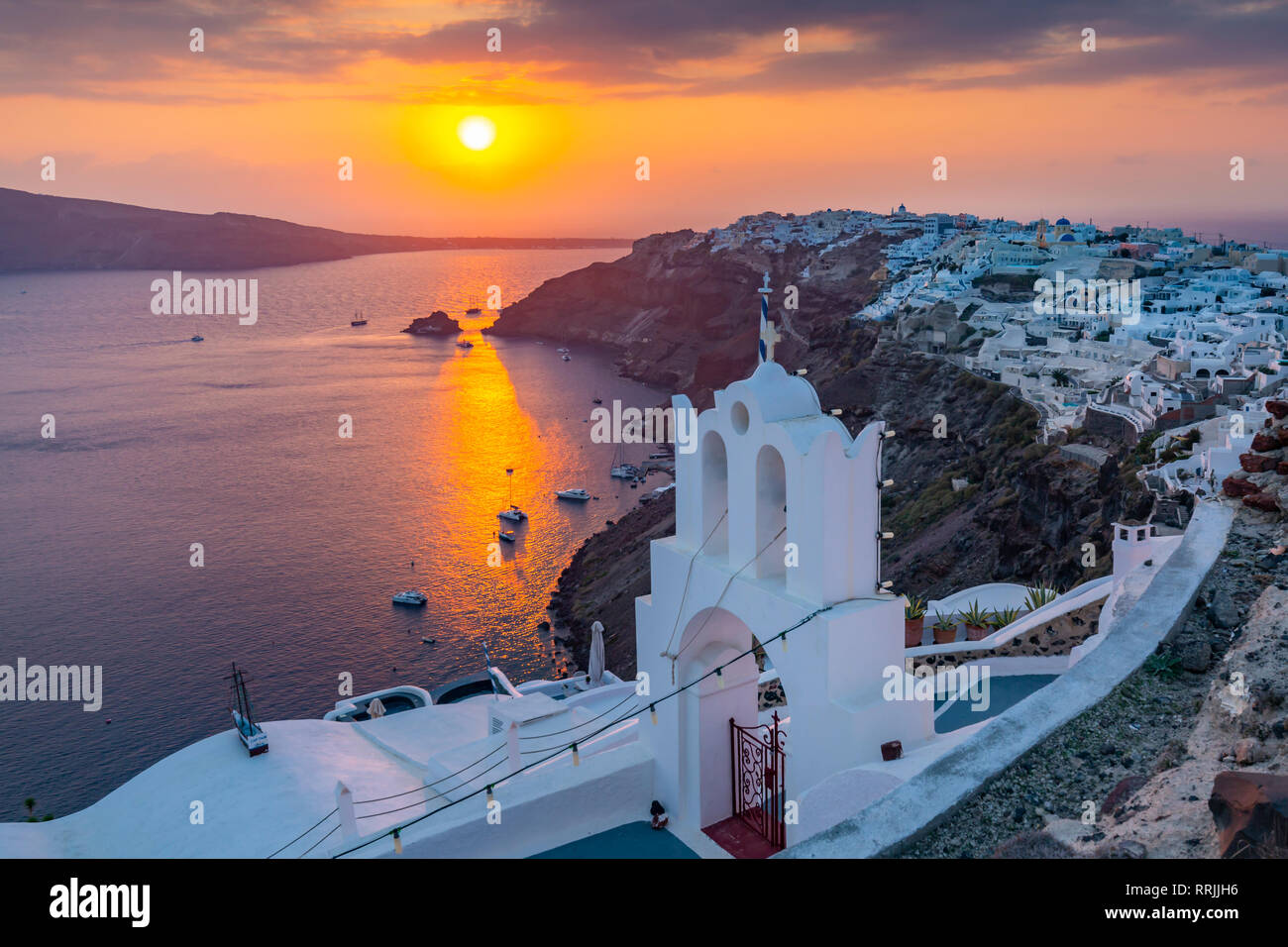 View of Oia village at sunset, Santorini, Cyclades, Aegean Islands, Greek Islands, Greece, Europe Stock Photo
