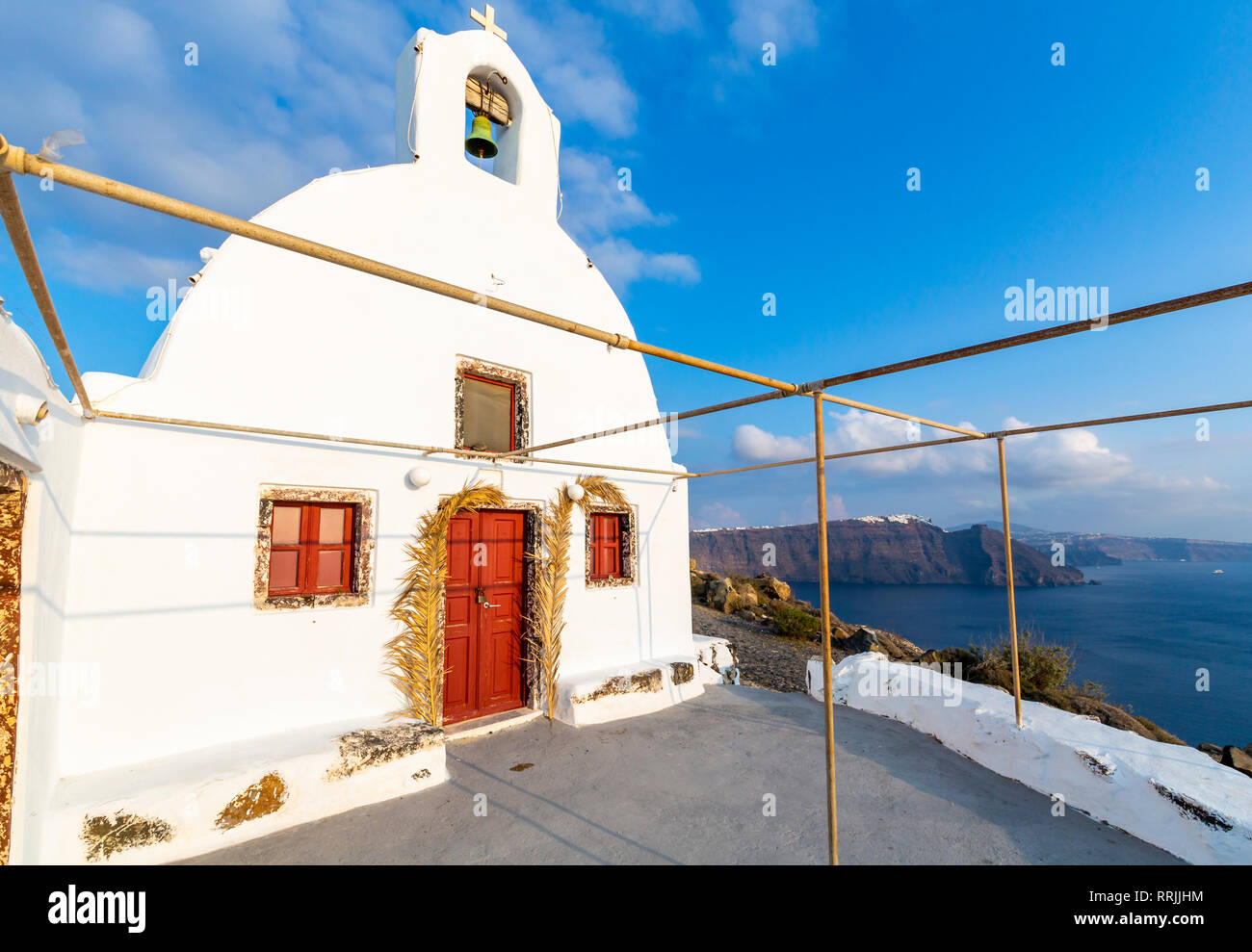 View of white washed hilltop church in Oia village, Santorini, Cyclades, Aegean Islands, Greek Islands, Greece, Europe Stock Photo
