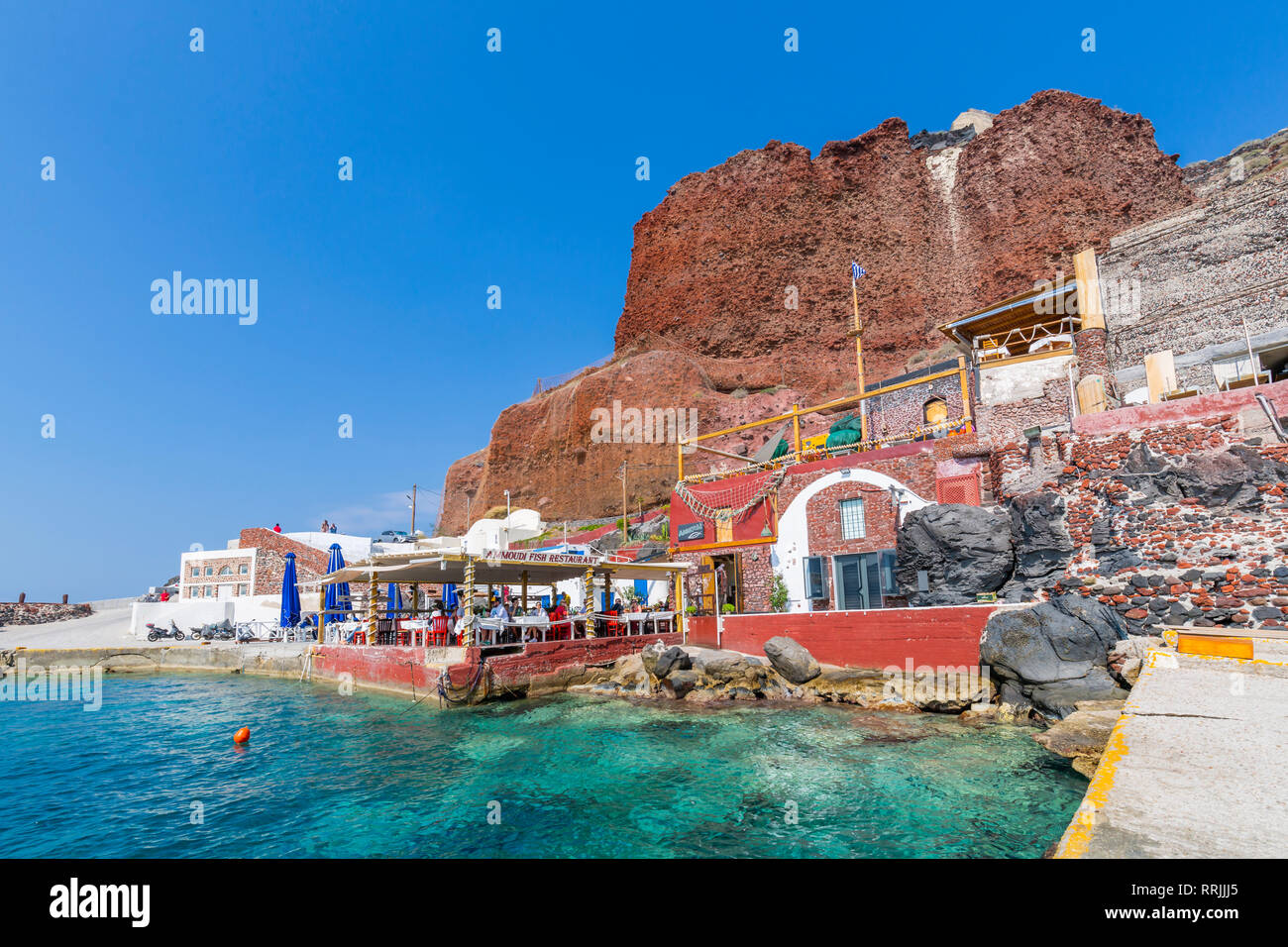 View of al fresco restaurant in little harbour, Santorini, Cyclades, Aegean Islands, Greek Islands, Greece, Europe Stock Photo