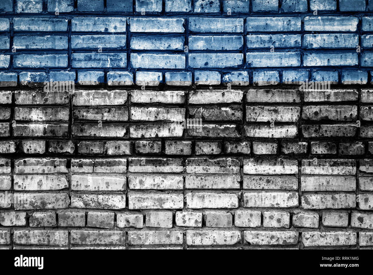 National flag of Estonia on a brick background. Concept image for ...