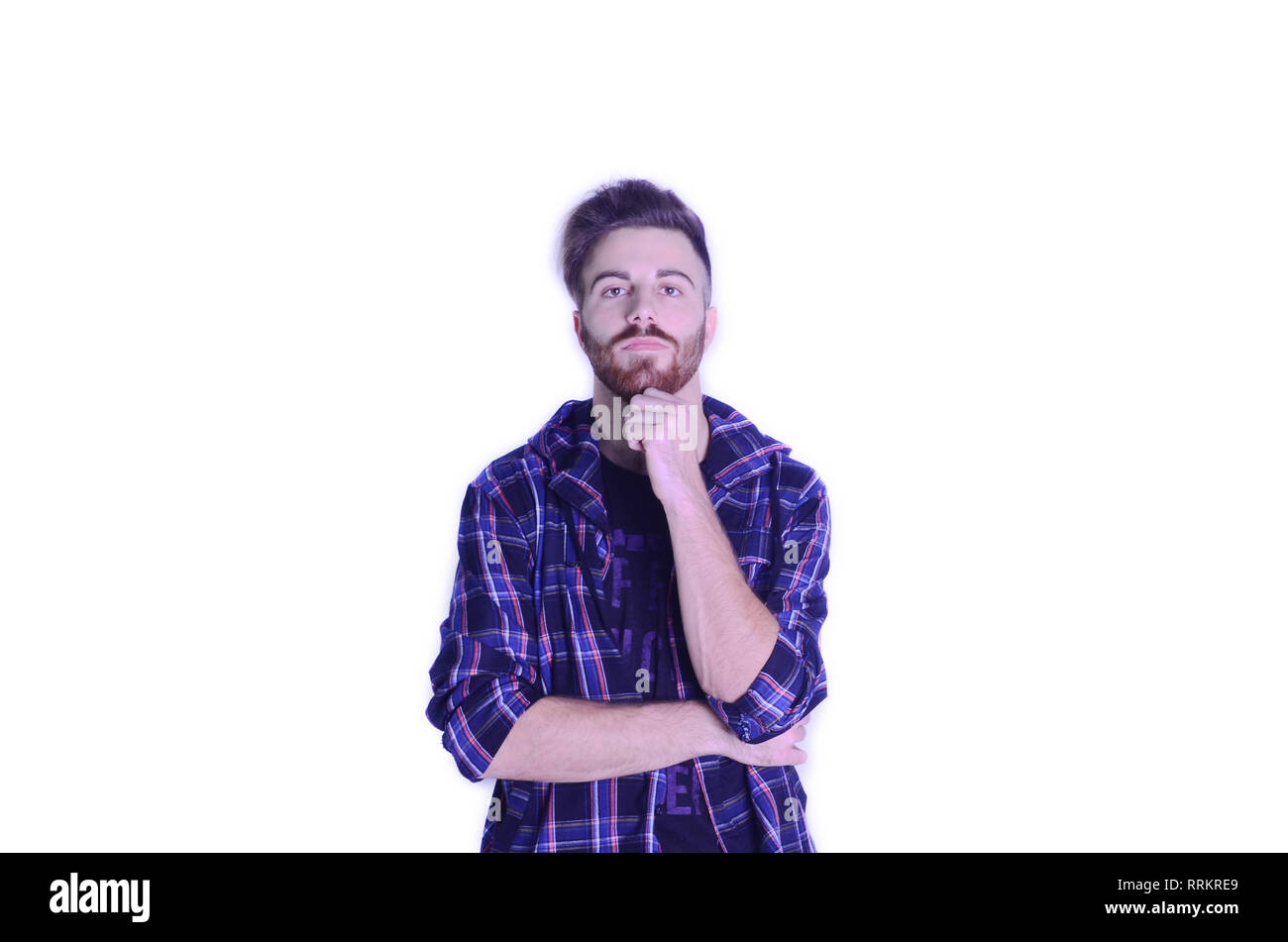 Young man worried looking at camera on isolated white background Stock ...