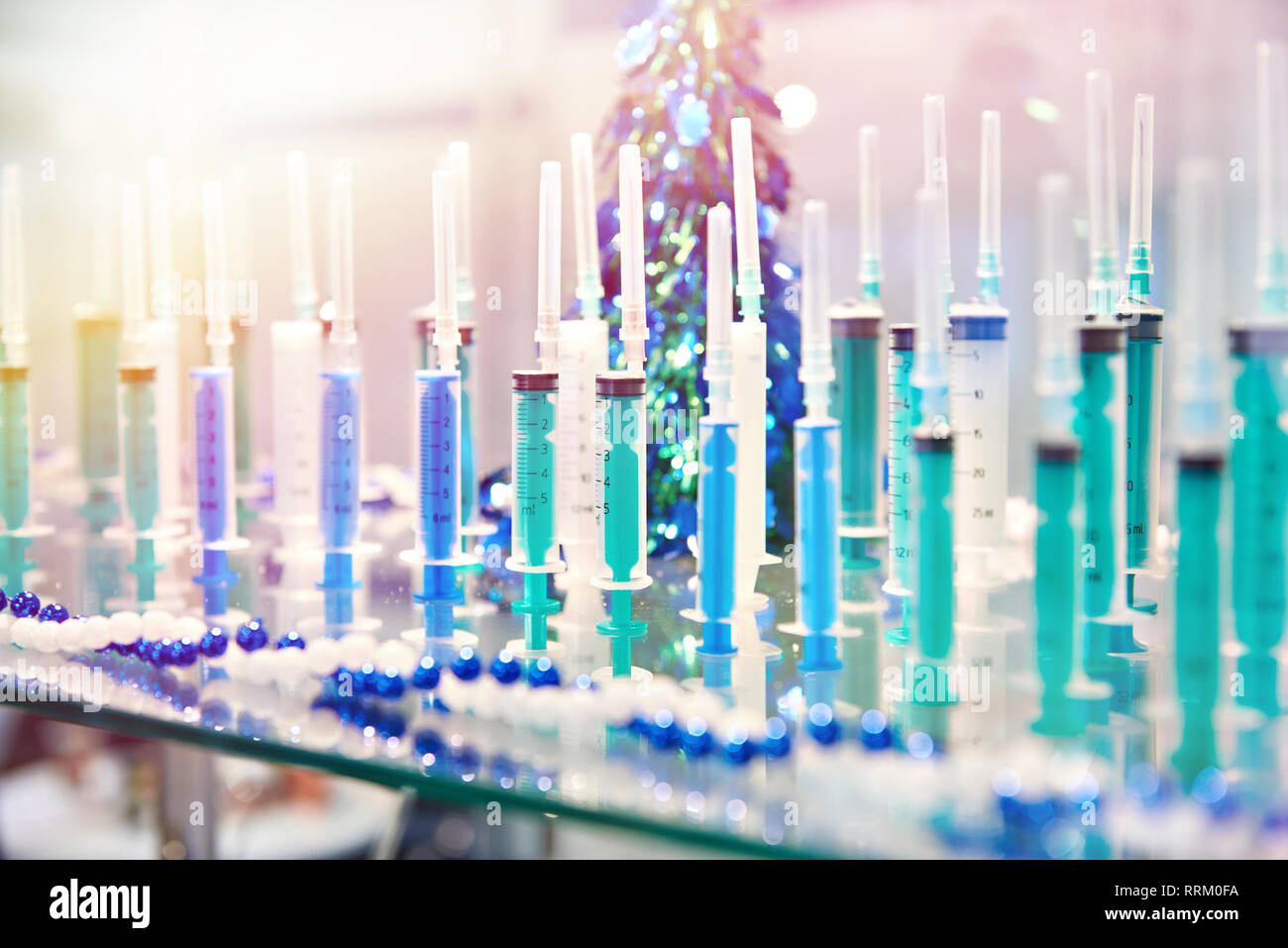 Medical disposable syringes of different colors Stock Photo - Alamy