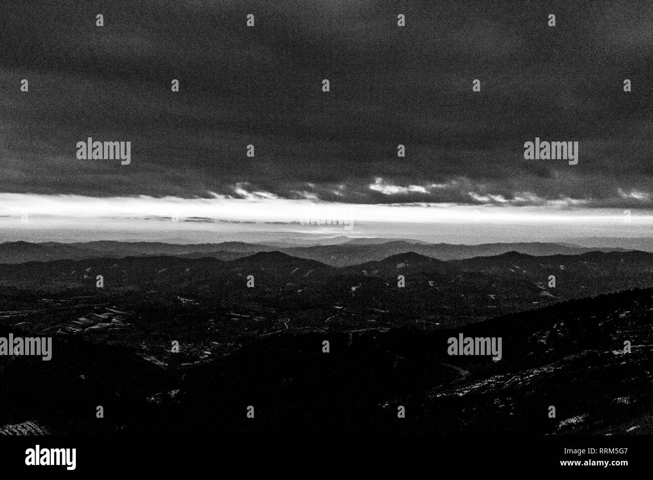 sky at dusk, with mountains layers Stock Photo Alamy