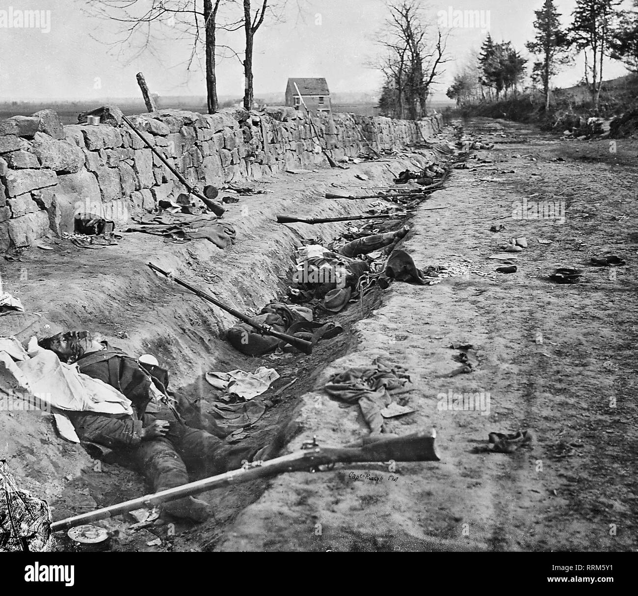 Confederate dead behind the stone wall of Marye's Heights, Virginia, killed during the Second Battle of Fredericksburg, which was in the eastern portion of the May 1863 Battle of Chancellorsville. Stock Photo