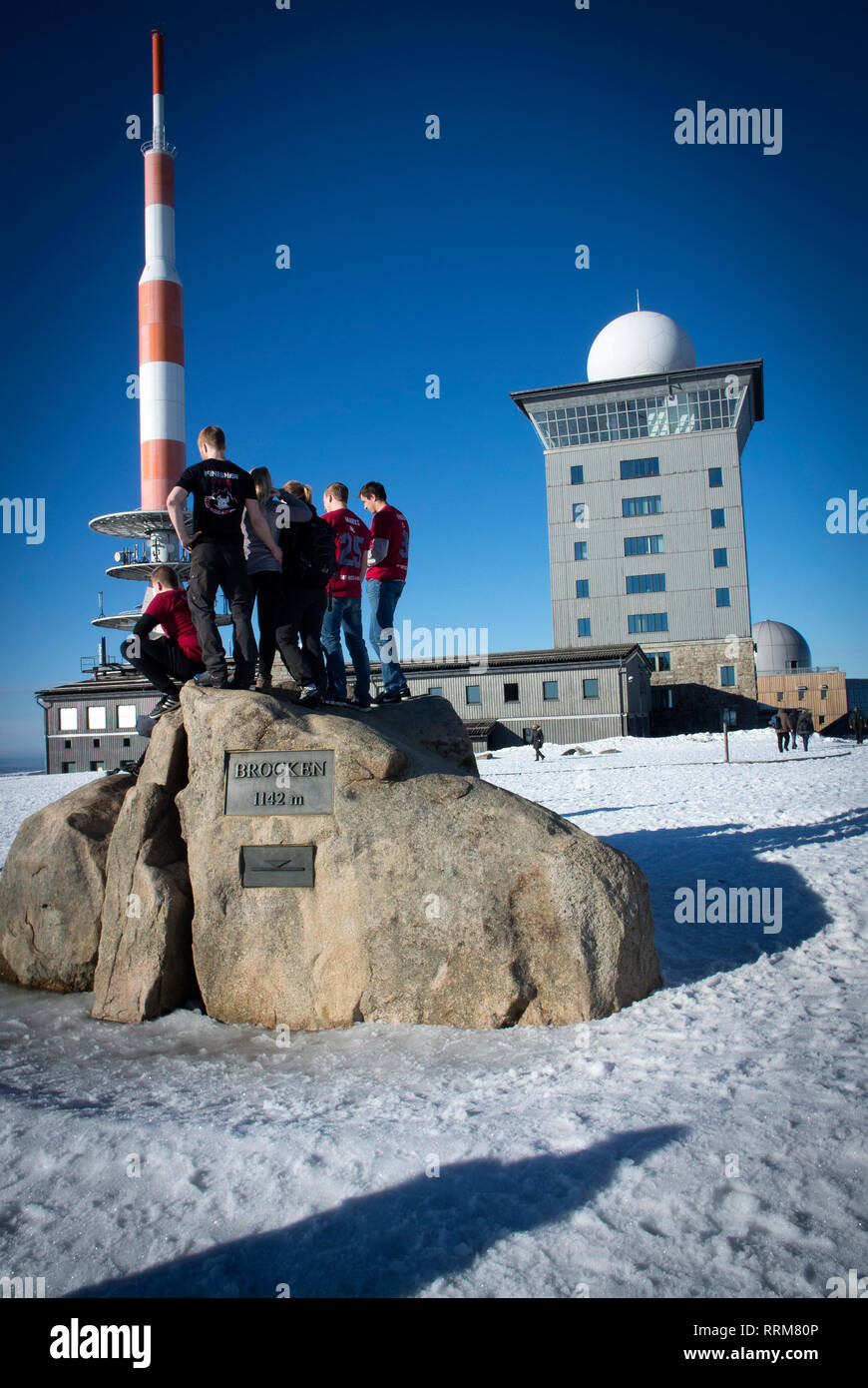 Walkers on the snow covered sumit of The Brocken in The Harz National Park, Germany Stock Photo