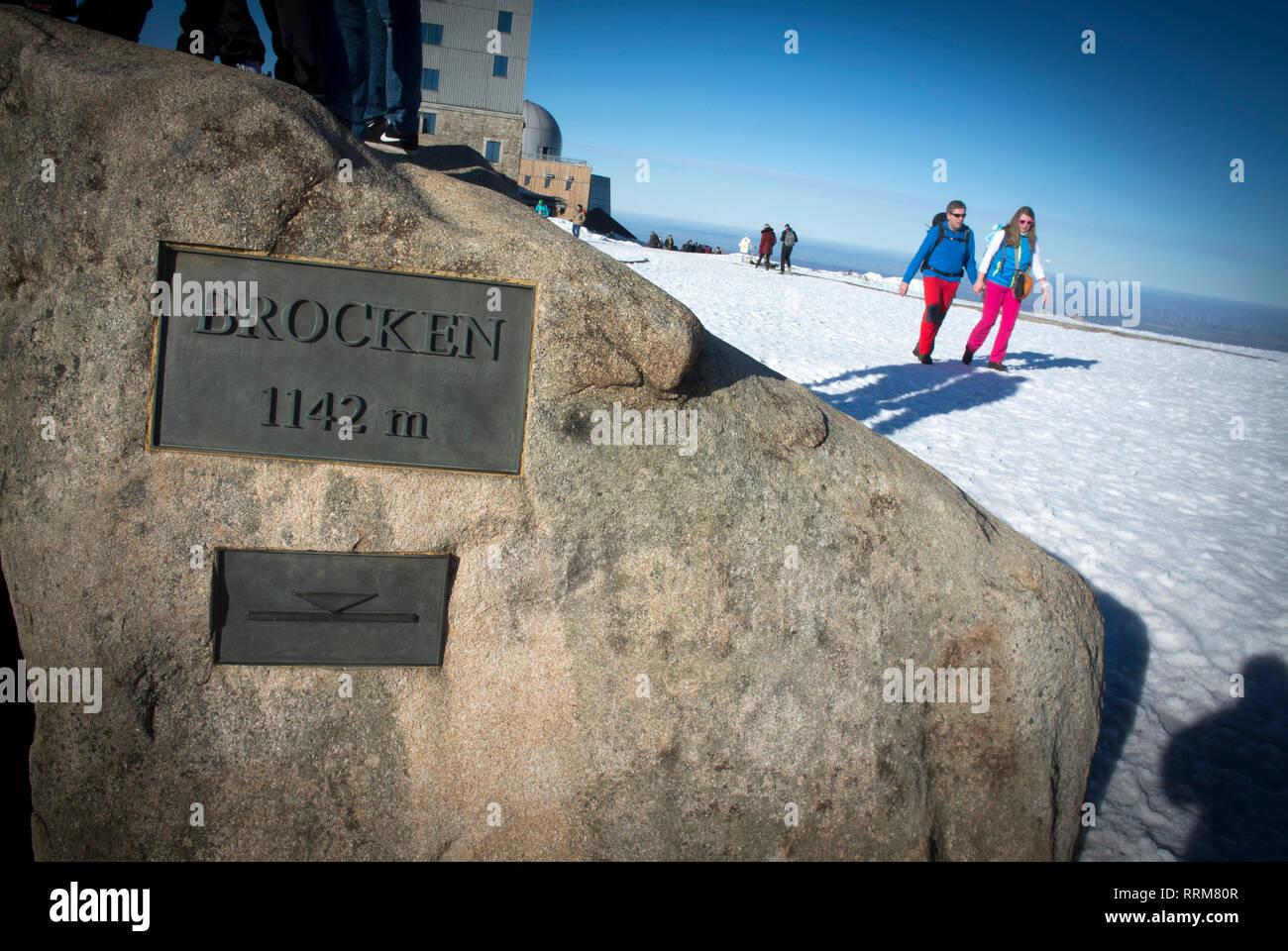 Walkers on the snow covered sumit of The Brocken in The Harz National Park, Germany Stock Photo