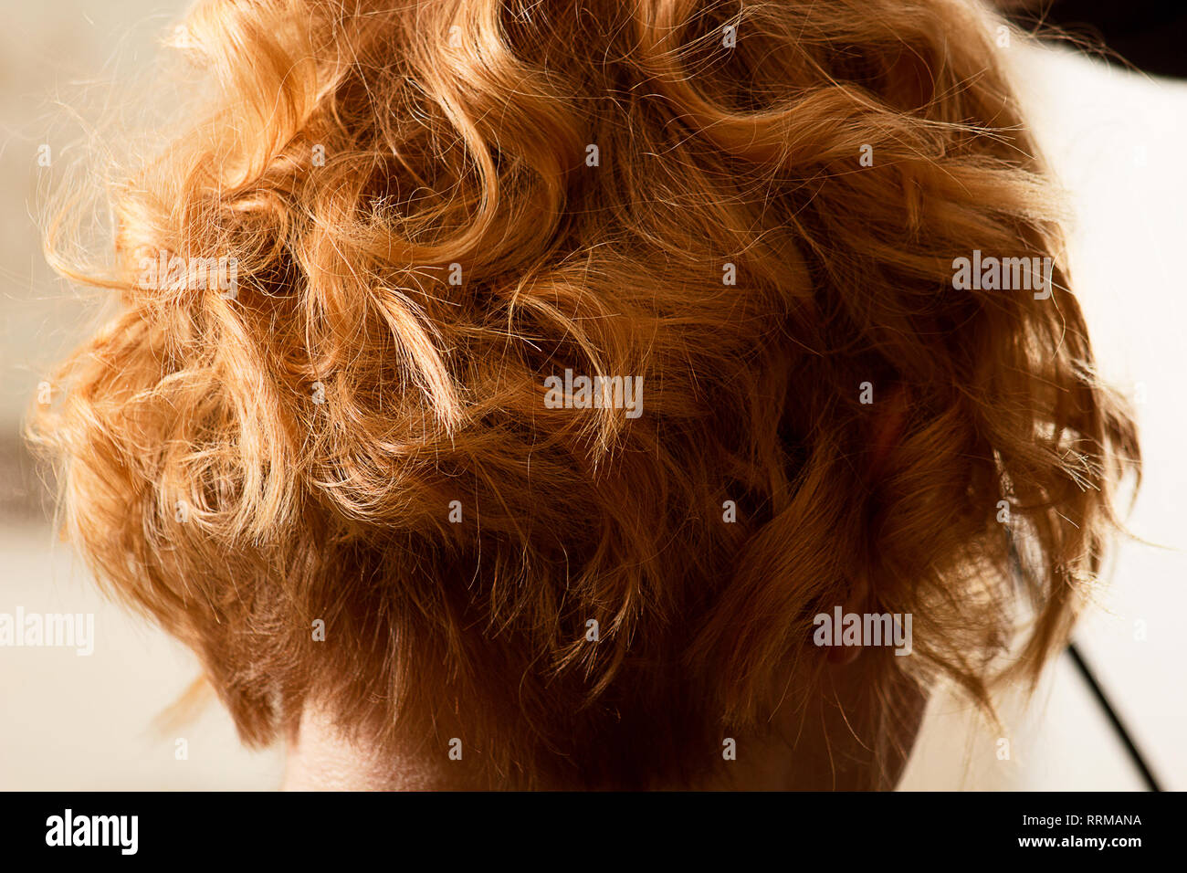 Hairstylist Curl Short Hair With Flat Iron Stock Photo Alamy