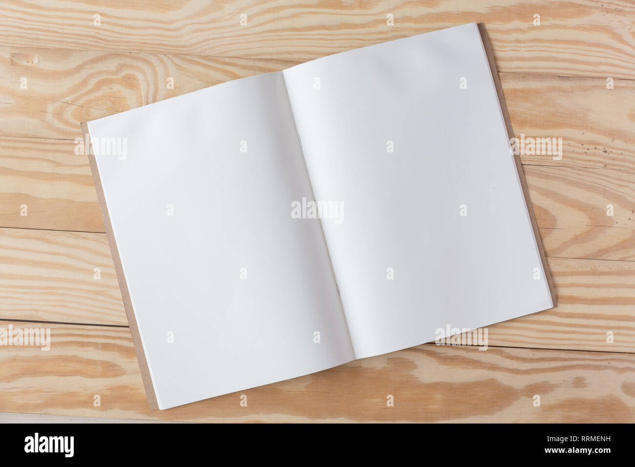 Abstract Blank one white paper on wooden table top view background