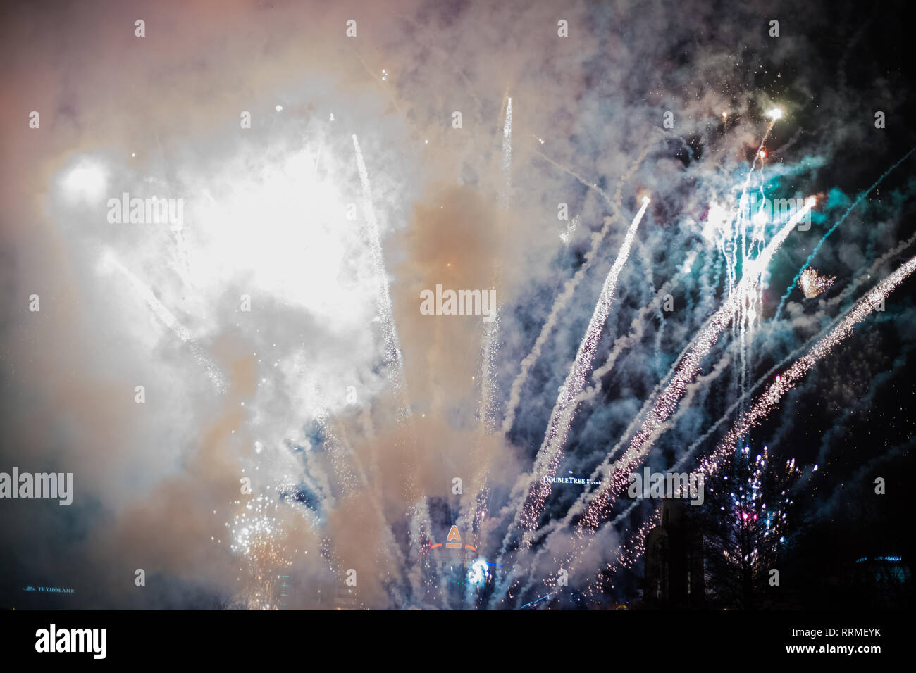 Explosive and colorful holiday fireworks at night sky Stock Photo - Alamy