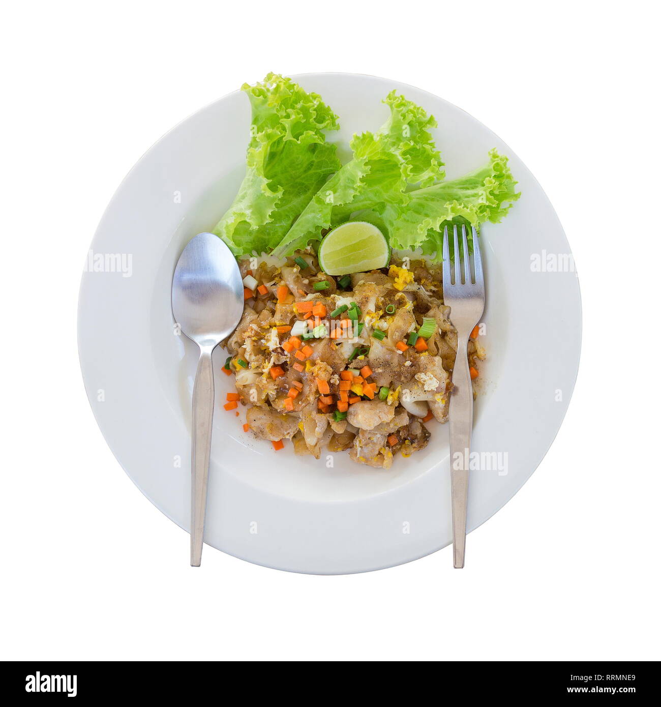 Top view of Thai Fried Noodles 'Pad Thai' with vegetables isolated on a white background. Stock Photo
