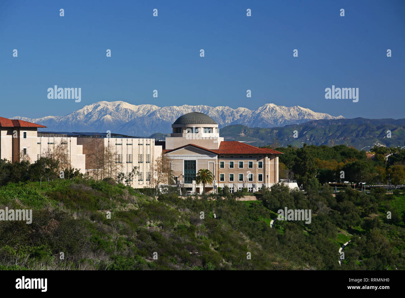 SOKA University with snow covered mountains Stock Photo