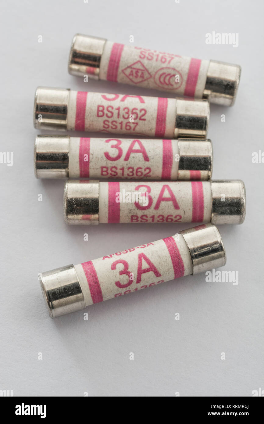 3 Amp household ceramic cartridge fuses. Stock Photo