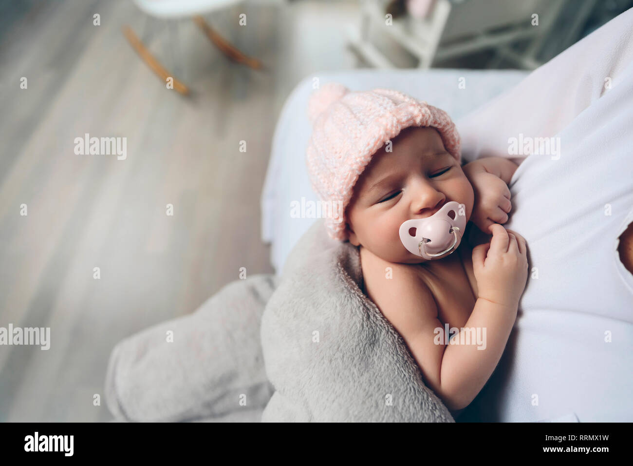 Newborn with pacifier hires stock photography and images Alamy