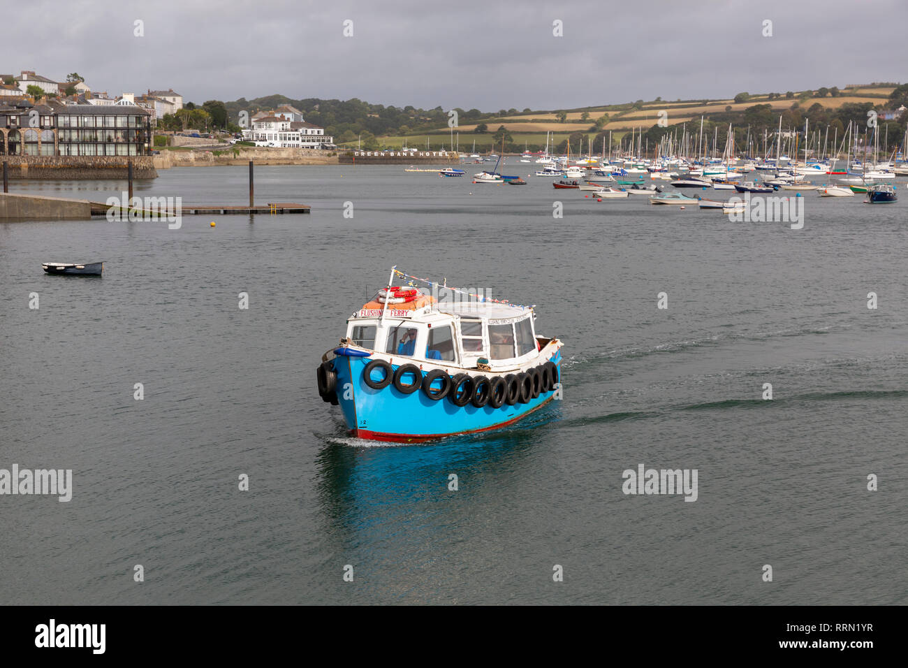 FALMOUTH, UK - SEPTEMBER 19, 2018: A ferry boat arriving at the Prince of Wales Pier in Falmouth to collect passengers to transport to Flushing Stock Photo