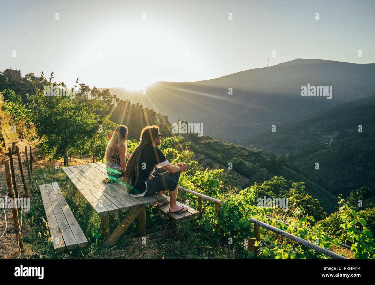Couple enjoying sunny, idyllic hillside view, Chas de Egua, Portugal Stock Photo