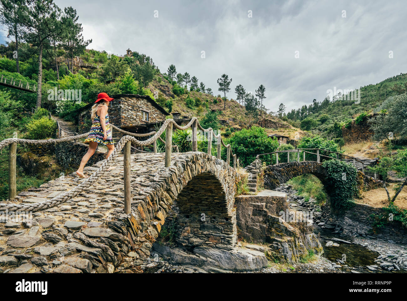 Couple enjoying hillside view, Chas de Egua, Portugal - Stock