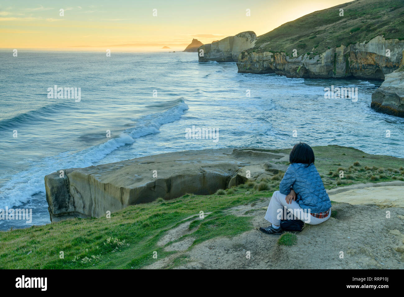 Woman watching waves hi-res stock photography and images - Alamy