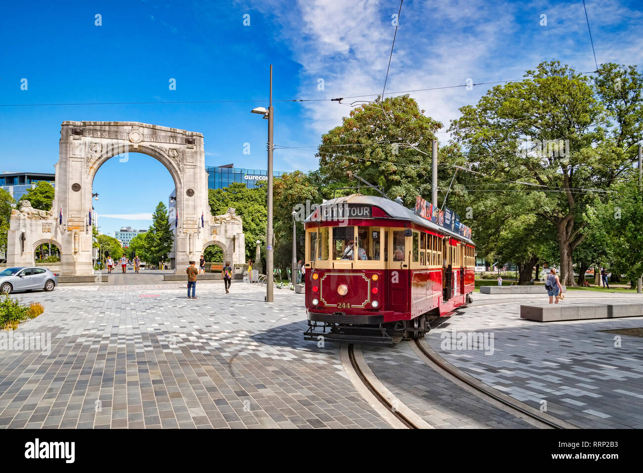 3 January 2019: Christchurch, New Zealand - A vintage tram turns into Cashel Street near the Bridge of Remembrance in the centre of Christchurch. Stock Photo