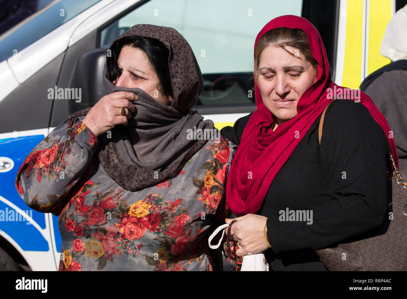 A group of women, one identified as the mother of the victim (name not given, left) arrive at at the scene on Norwood Road, Bordesley Green where 17-year-old Hazrat Umar was stabbed and killed on Monday, becoming the third teenager in a fortnight to be stabbed to death in Birmingham. Stock Photo