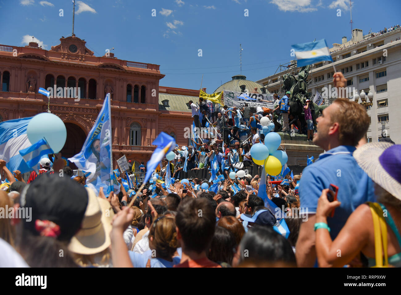 Buenos Aires, Argentina - Dec 10, 2015: Supporters of the newly elected Argentinean president wave flags on inauguration day at the Plaza de Mayo. Stock Photo