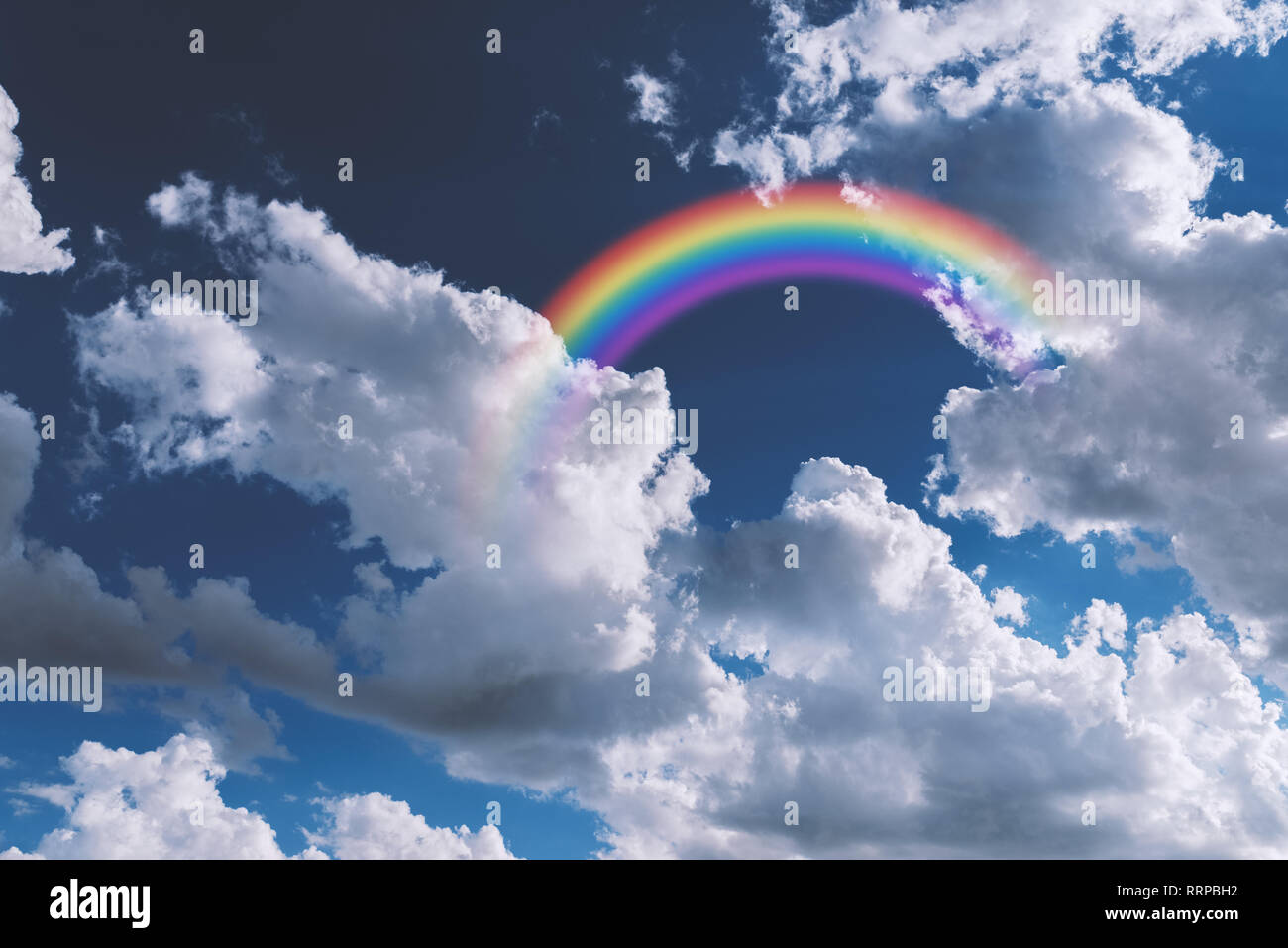 Rainbow in clouds hi-res stock photography and images - Alamy