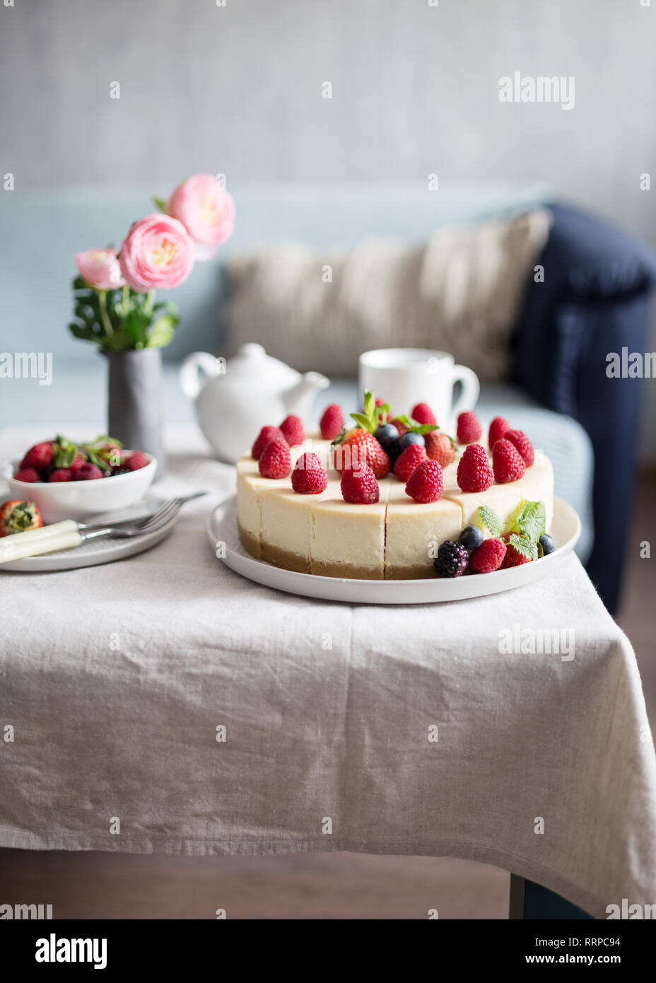 Delicious strawberry pie with fresh blueberry on table, cheesecake. Concept of sweet food, idea of healthy life Stock Photo