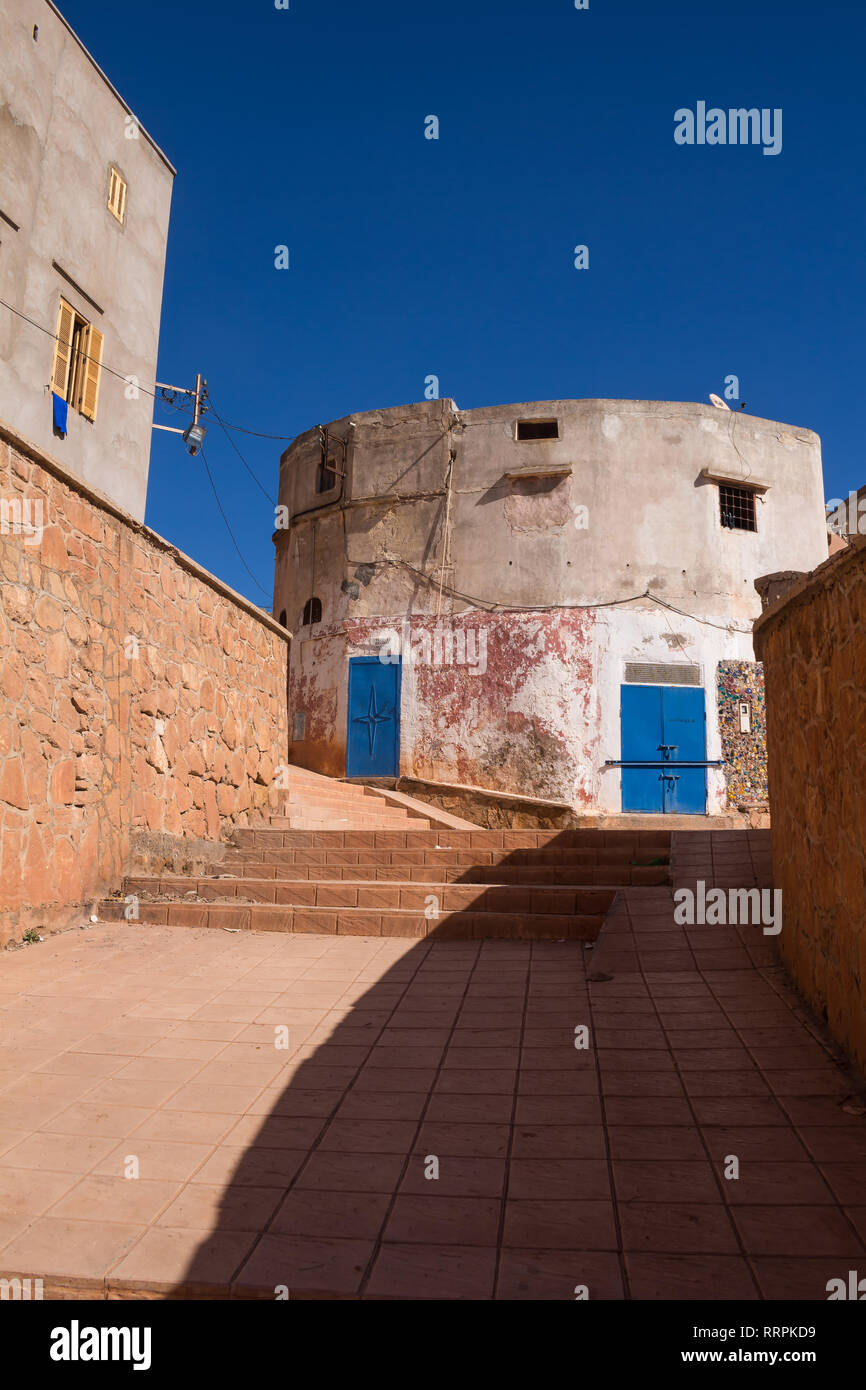 New stairs up the hill to the houses, where is located the traditional ceramics production. Brigh blue sky, matching with the color of the gates. Safi Stock Photo