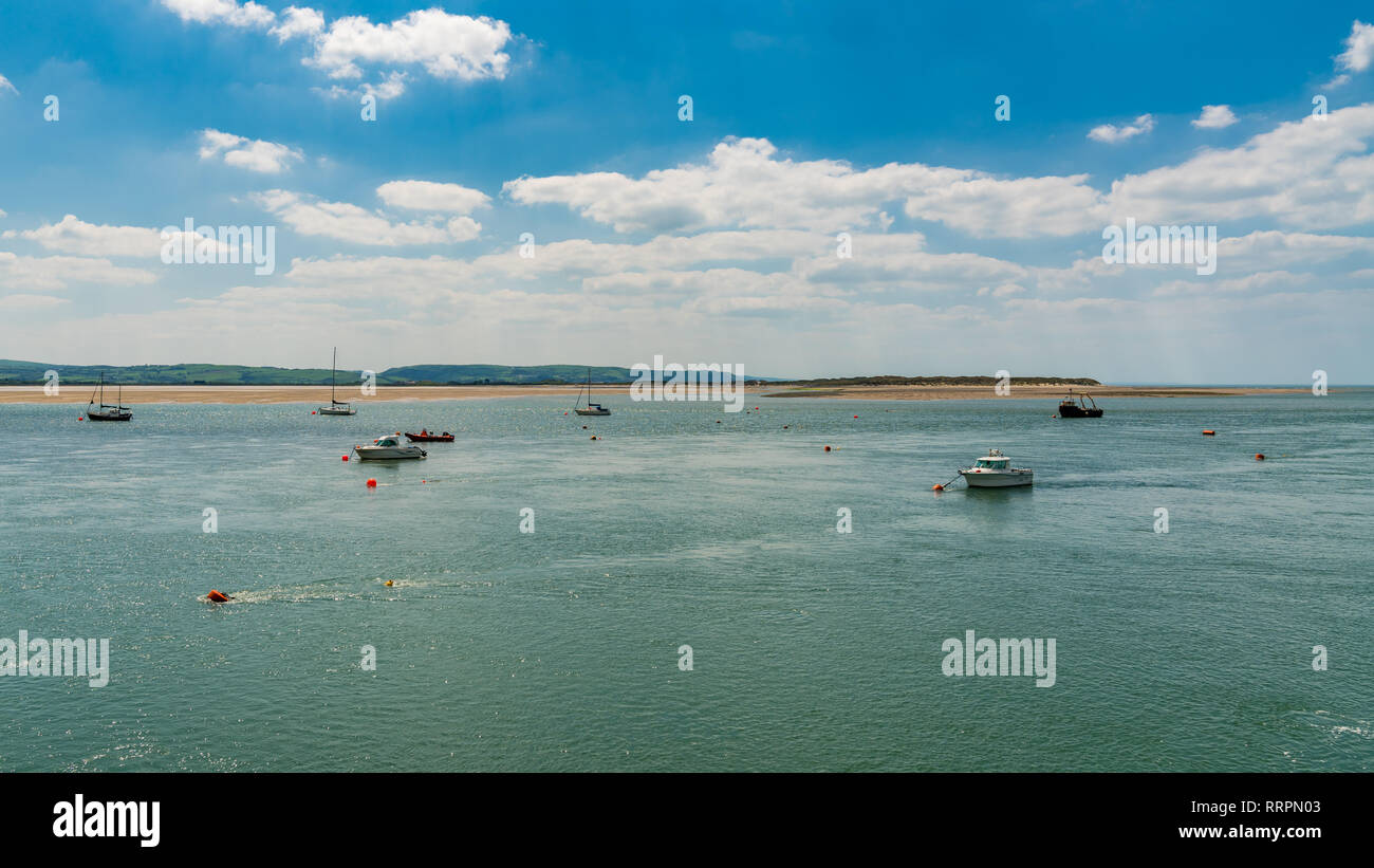 Aberdyfi, Gwynedd, Wales, UK - May 25, 2017: View from the beach towards boats in the river Stock Photo