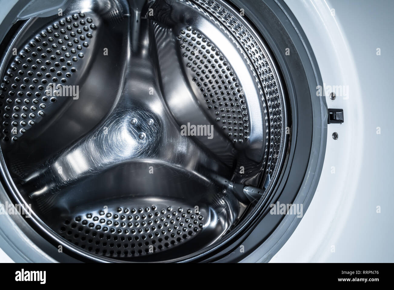 Clean drum of a modern washing machine close up Stock Photo Alamy