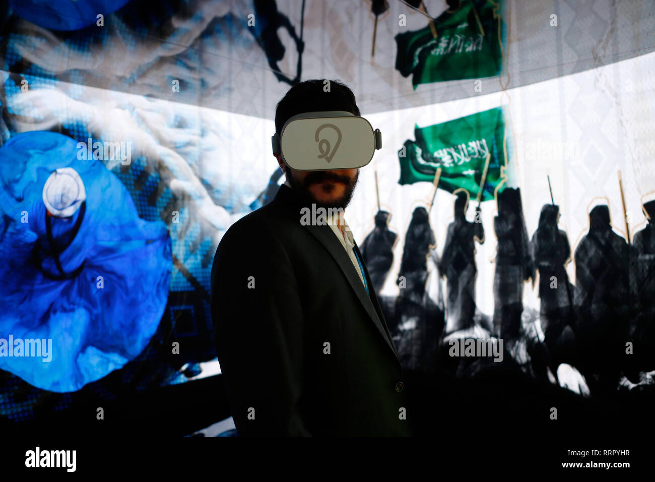 Barcelona, Spain. 26th Feb, 2019. At the Mobile World Congress 2019 in Barcelona, a visitor tests VR glasses at the stand of the Saudi Telecom Company. The Mobile World Congress runs from 25 to 28 February. Credit: Clara Margais/dpa/Alamy Live News Stock Photo