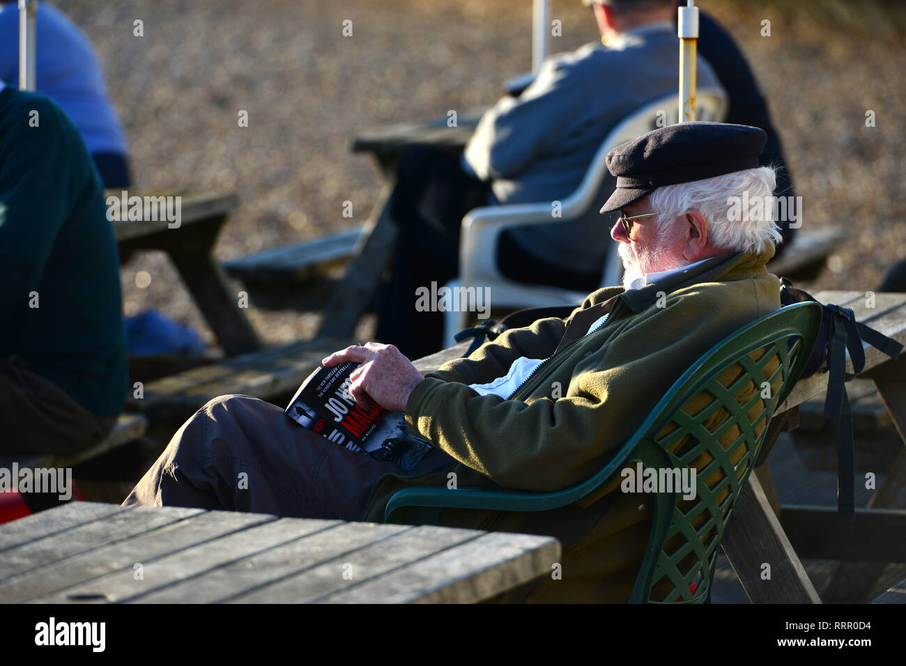 Seaford, East Sussex, UK. 26th Feb, 2019. People enjoying the warm sun in Seaford, East Sussex, on the hottest winter day on record. Credit: Peter Cripps/Alamy Live News Stock Photo