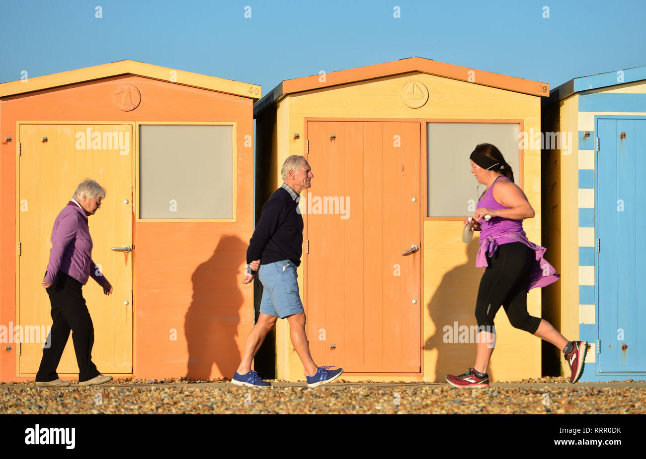 Seaford, East Sussex, UK. 26th Feb, 2019. People enjoying the warm sun in Seaford, East Sussex, on the hottest winter day on record. Credit: Peter Cripps/Alamy Live News Stock Photo