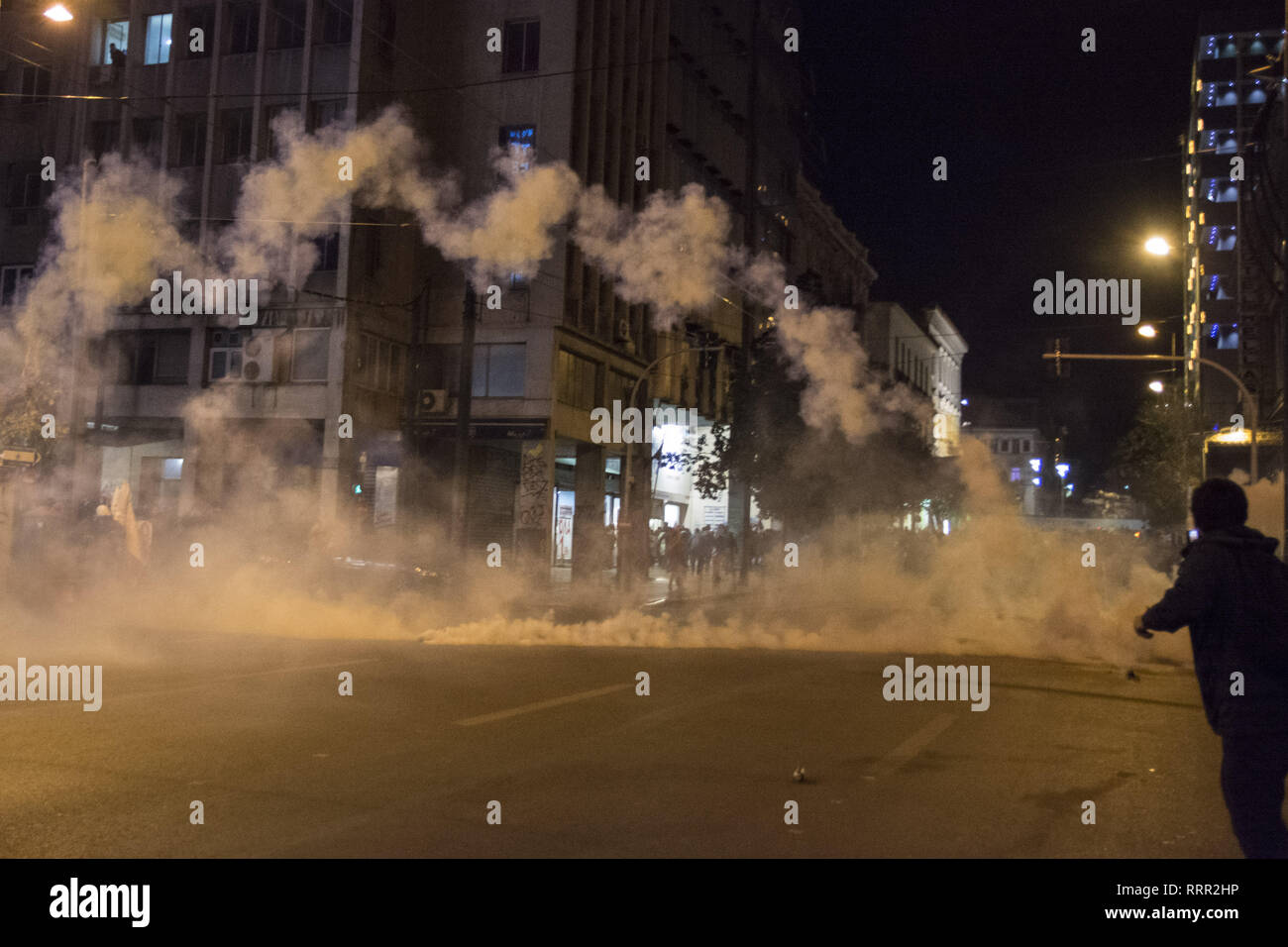 Athens, Greece. 26th Feb, 2019. Police fire tear gas responding to stones thrown at them by protesters who took to the streets over Ebuka's death case. Ebuca Mama Subek, a 34 year old Nigerian migrant, married and father of two children, died while in custody in the Omonia police station in the center of Athens, a police station with a long history of torture, abuse and unexplained deaths cases. Credit: Nikolas Georgiou/ZUMA Wire/Alamy Live News Stock Photo