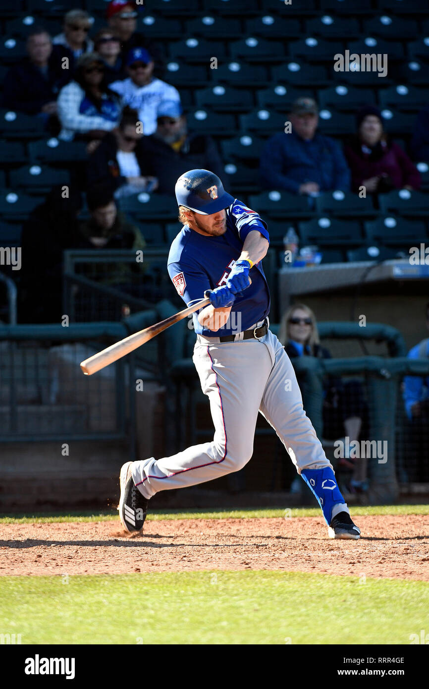 Surprise, Untied States. 23rd Feb, 2019. Texas Rangers first baseman  Patrick Wisdom hits during a MLB spring training baseball game against the  Kansas City Royals at Surprise Stadium, Friday, Feb. 22, 2019,