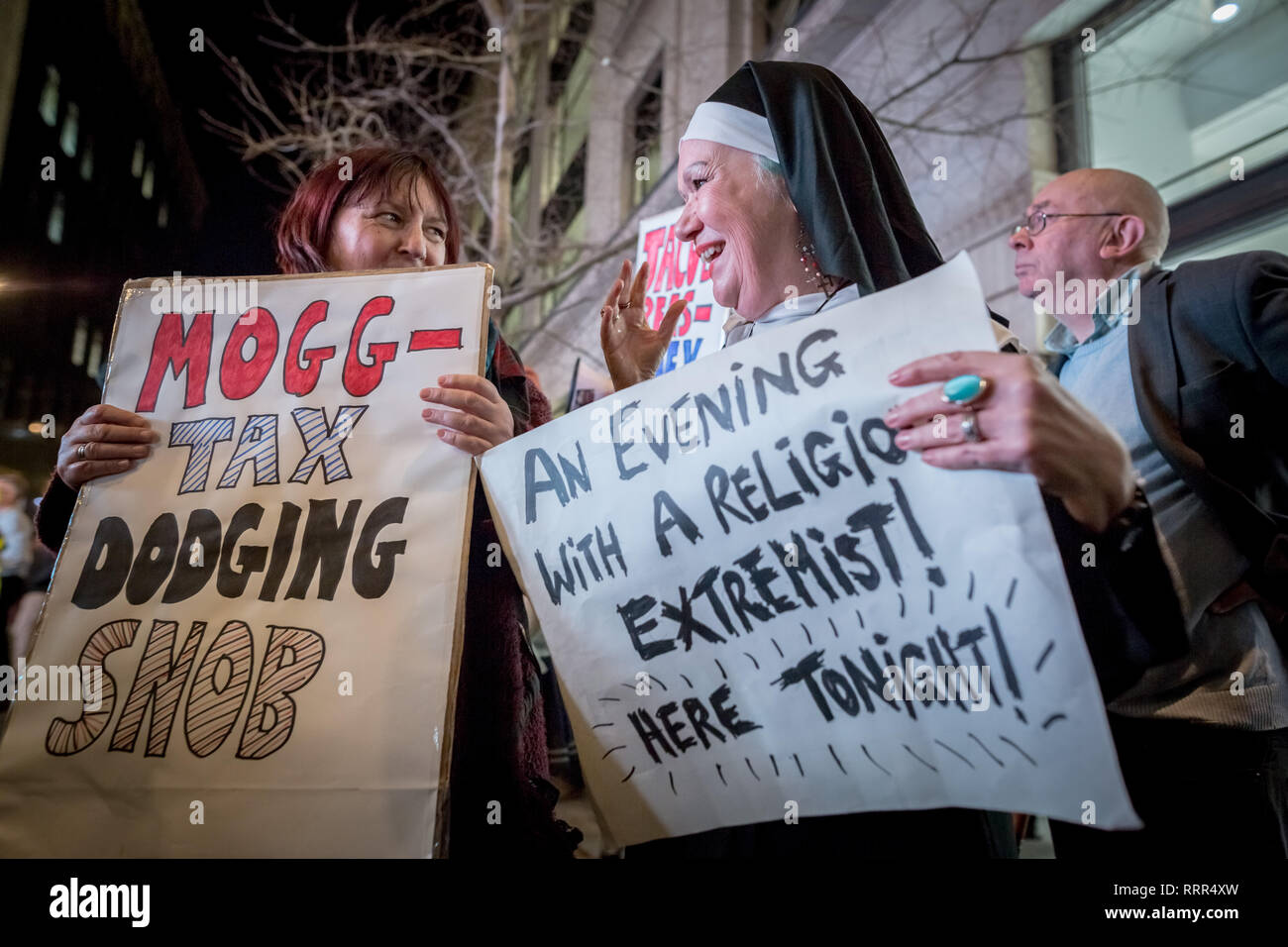 Protesters from Class War anarchist group hold a lively demonstration outside the London Palladium theatre against the evening talk featuring Jacob Rees-Mogg, Conservative MP and prominent Brexit supporter. Class War members, including long-time anarchist, Ian Bone (with megaphone), Jane Nicholl (pictured dressed as a nun) and Adam Clifford (as Rees-Mogg parody) claim Mr Rees-Mogg, a Catholic, is a religious extremist because of his outspoken views on abortion. Stock Photo