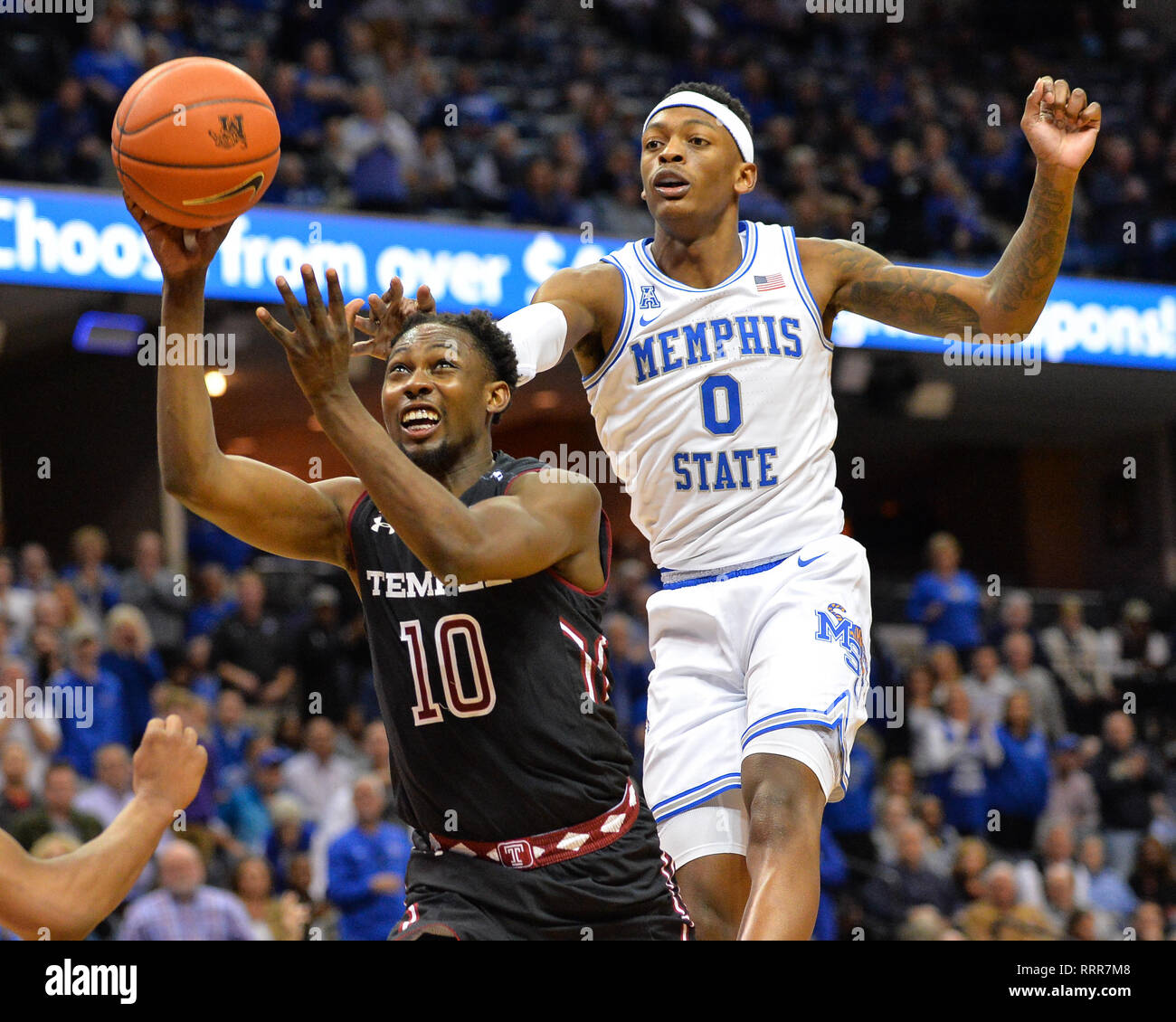 Memphis, TN, USA. 26th Feb, 2019. Temple guard, Shizz Alston Jr. (10), gets past Memphis forward, KYVON DAVENPORT (0), and heads for the basket, during the NCAA basketball game between the Temple Owls and the Memphis Tigers at the Fed Ex Forum in Memphis, TN. Memphis defeated Temple, 81-73. Kevin Langley/Sports South Media/CSM/Alamy Live News Stock Photo