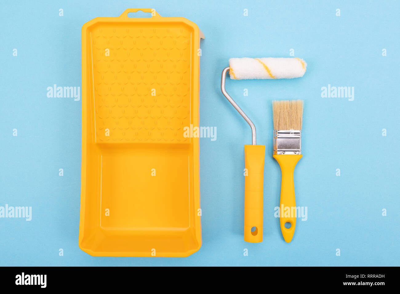 Paint tools. Paint brush and roller with tray for paint. Mockup Stock Photo Alamy