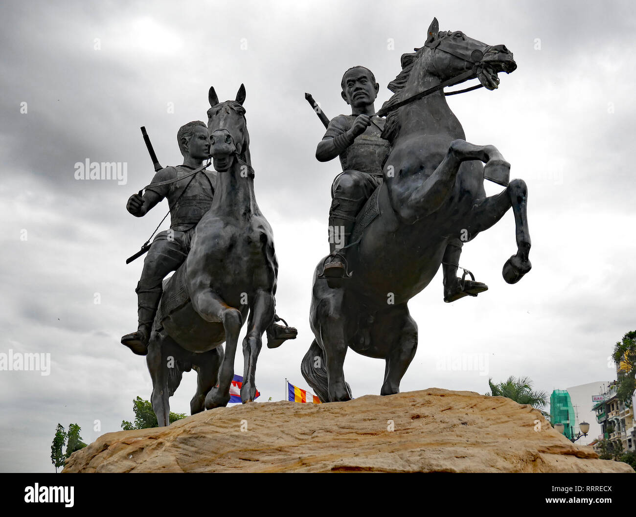 Horse Statue, Riverside walk. The Royal Warriors monument, of men on horseback with swords across their backs. Riverside Walk, Phnom Penh, Cambodia. Stock Photo