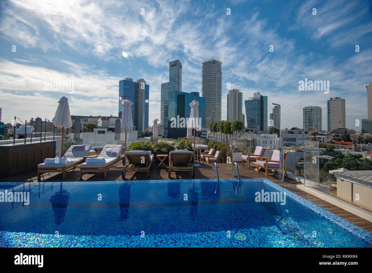 Tel Aviv's skyline from the rooftop swimming pool of The Norman, boutique hotel, Israel Stock Photo