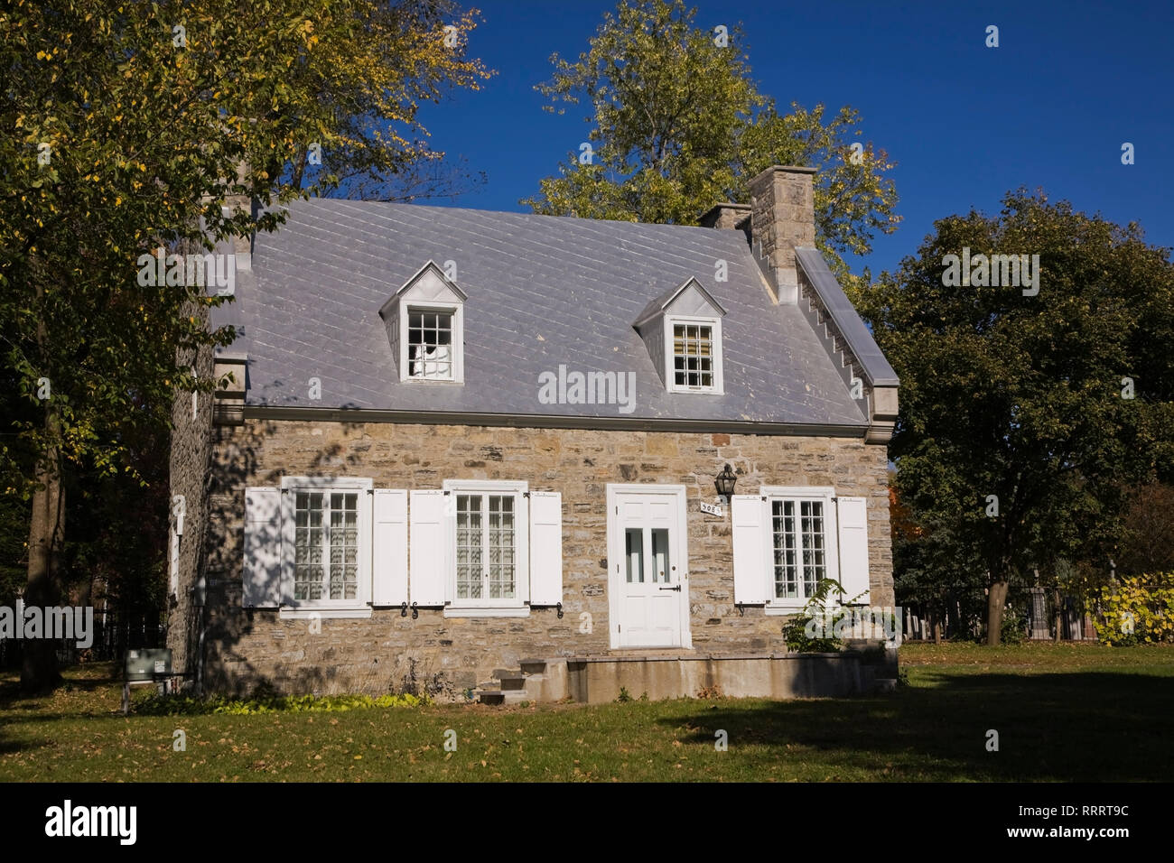 Simon-Lacombe (1825-1848) fieldstone House in Notre-Dame-des-Neiges cemetery on Mount Royal in autumn, Montreal, Quebec, Canada Stock Photo