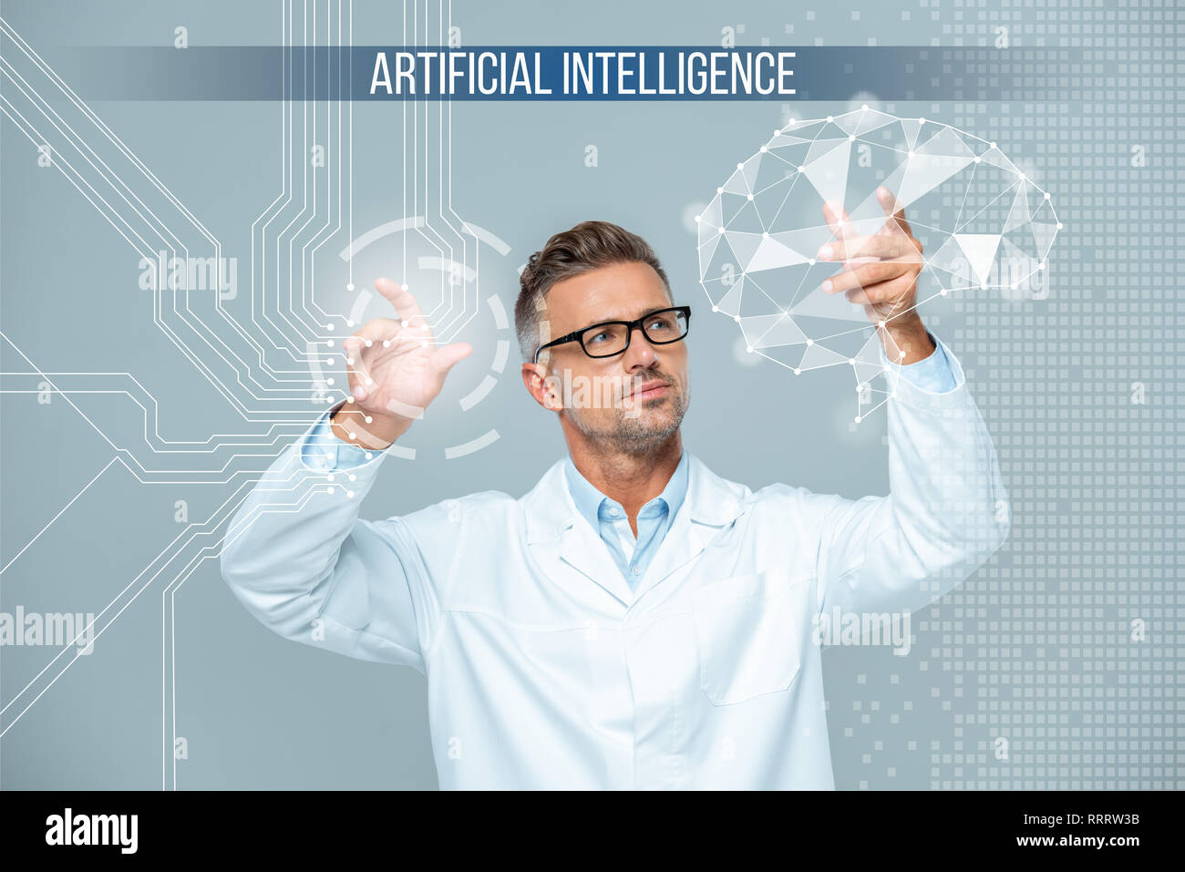 handsome scientist in white coat and glasses moving brain interface