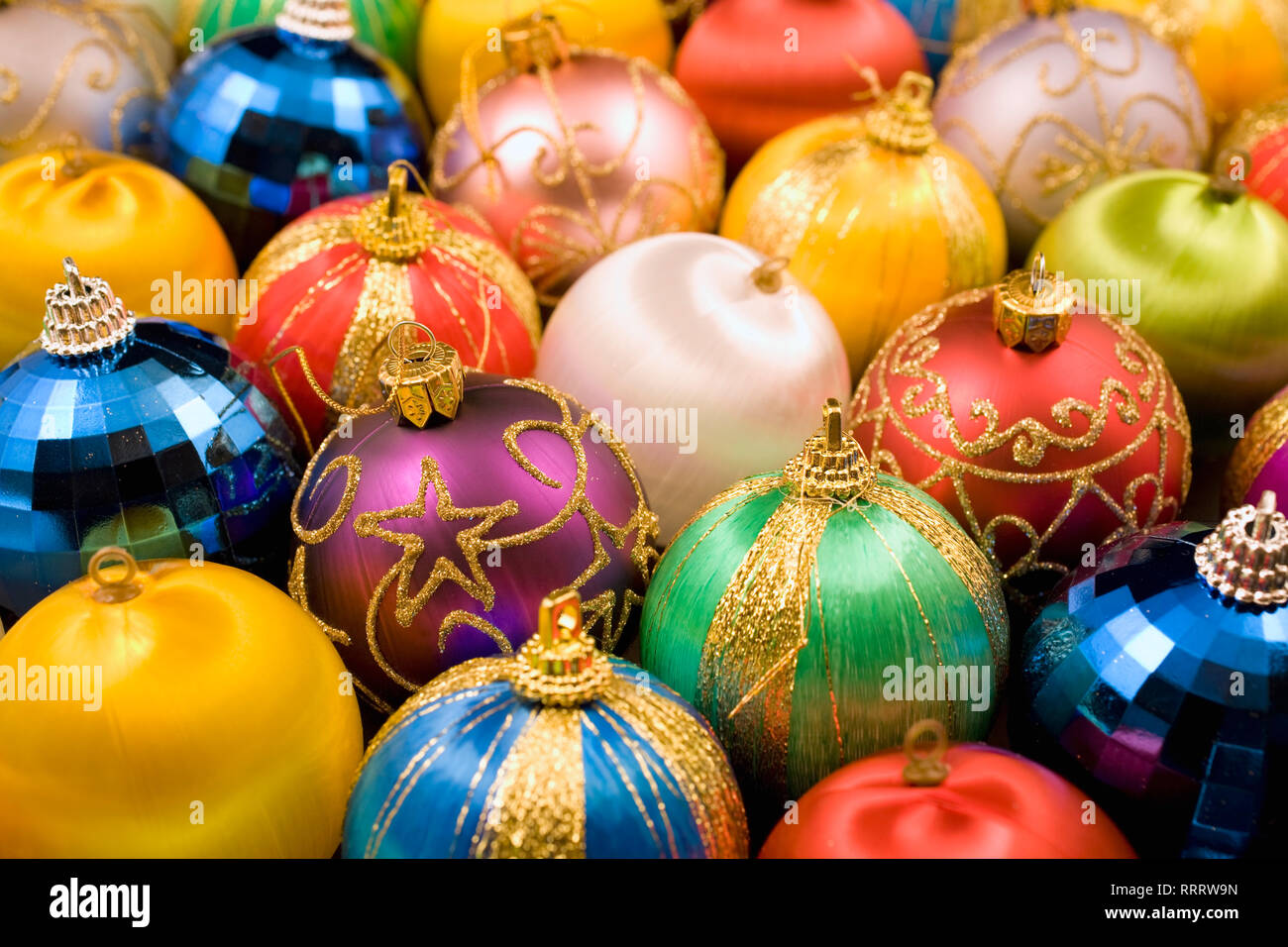 Assorted colored silk spherical shaped Christmas Tree Ornaments Stock Photo