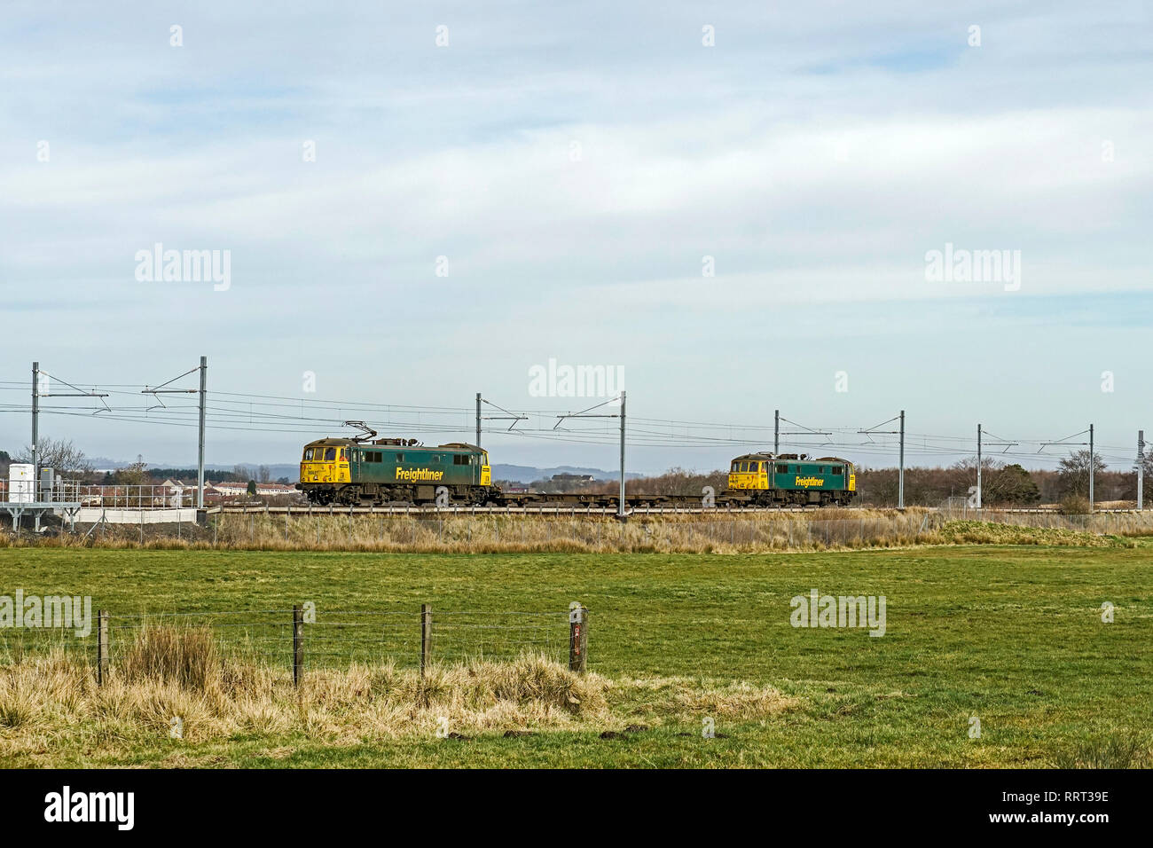Network Rail test train with two Class 86 electric locomotives on the electrified railway line between Glasgow Central and Edinburgh through Shotts Stock Photo