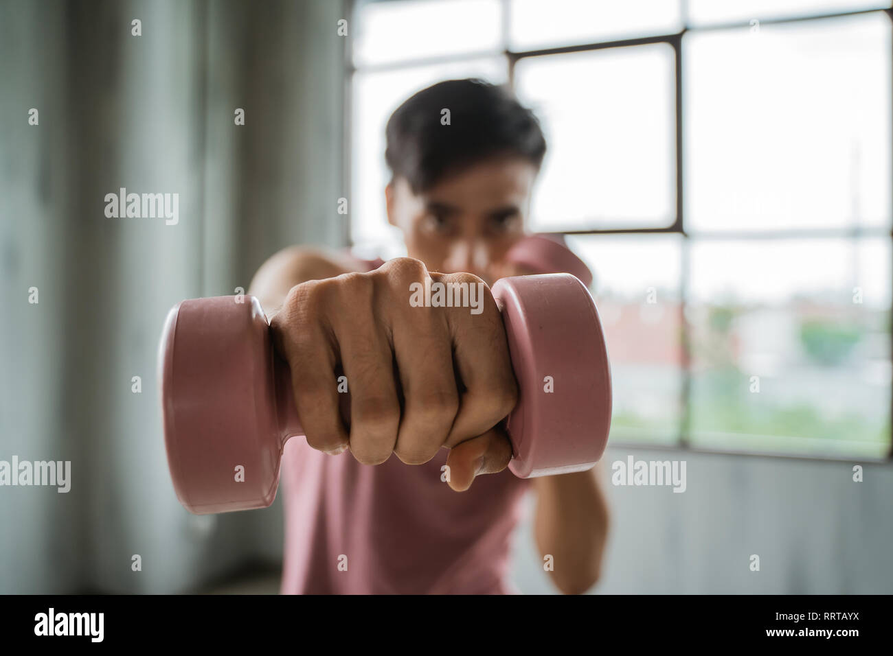 dumbbell punch towards the camera Stock Photo Alamy