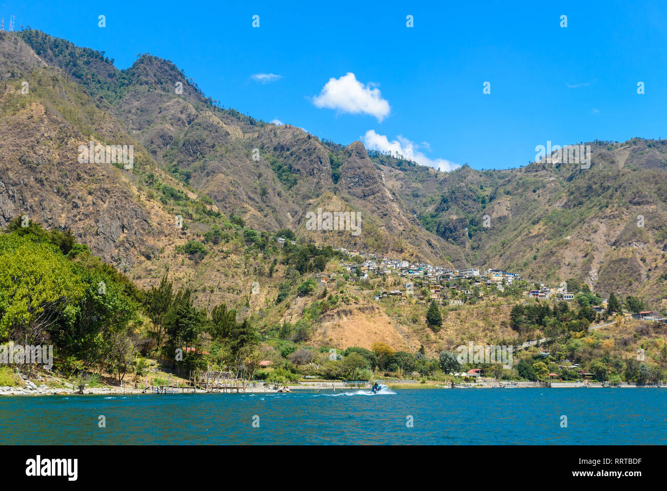 Shore of Santa Cruz la Laguna at Lake Atitlan in vulcano landscape of Guatemala Stock Photo