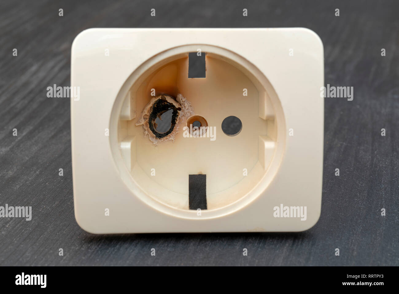 Burnt electrical outlet Stock Photo Alamy