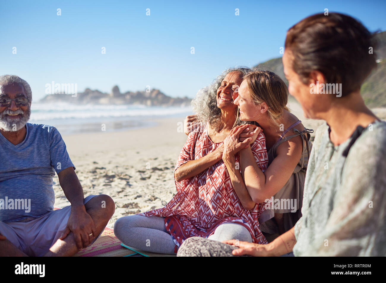 Group of women hugging hi-res stock photography and images - Alamy