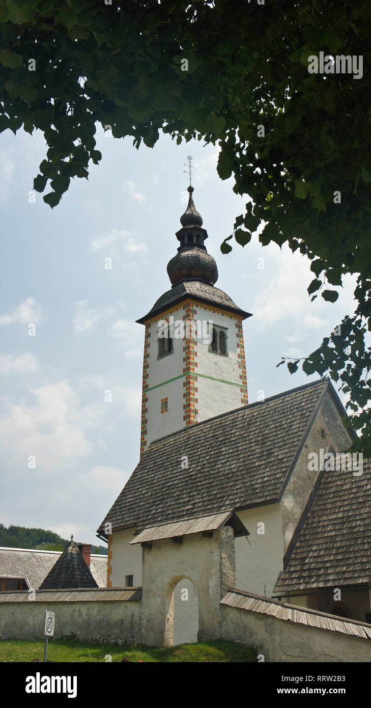 View of the tower of Church of St. John the Baptist, Bohinj Stock Photo ...