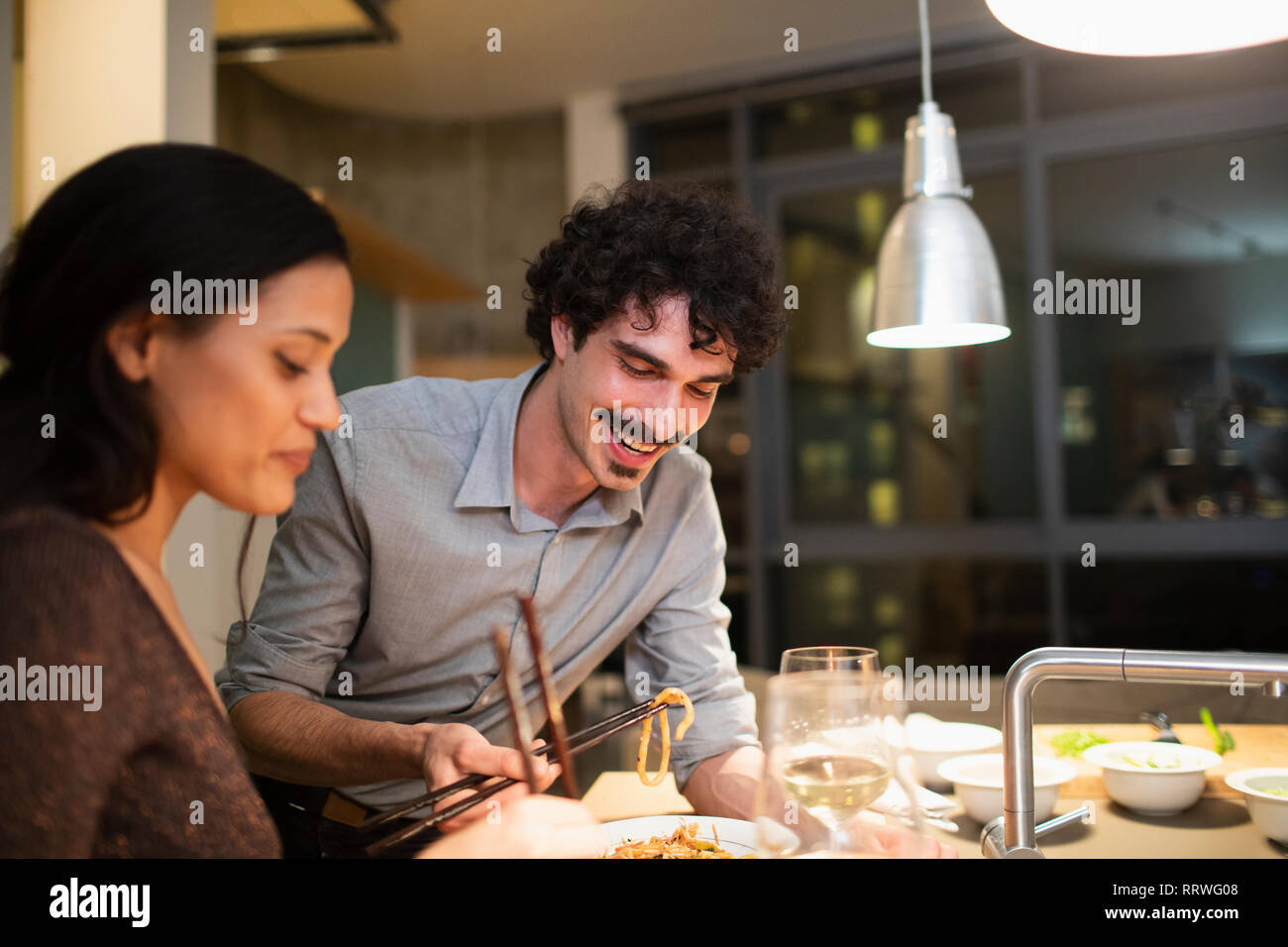 Smiling sitting eating food and drink hi-res stock photography and ...