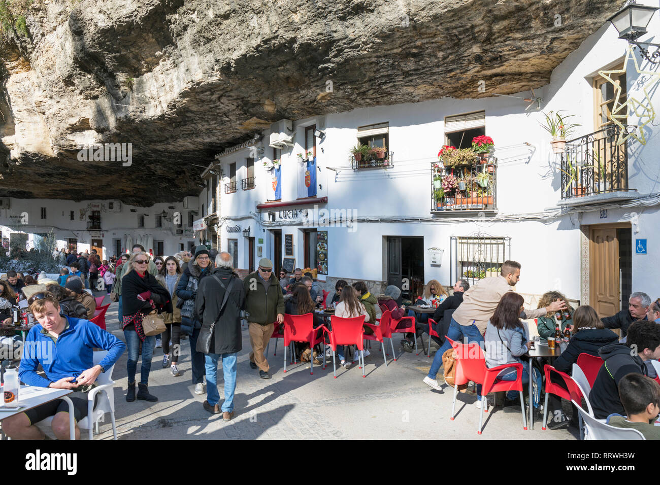 Setenil de las Bodegas, Cadiz Province, Spain.  Commonly known simply as Setenil.  Houses, now mostly restaurants, built into overhanging rock walls. Stock Photo